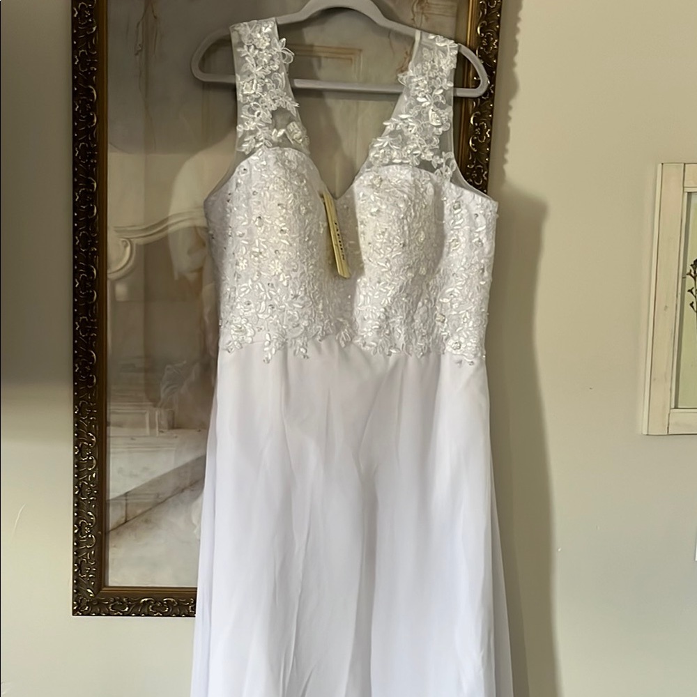 White Sleeveless V-Neck Wedding Gown